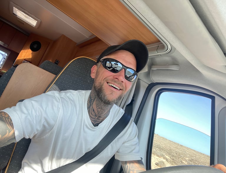 seamusthefreenomad happy in camper van