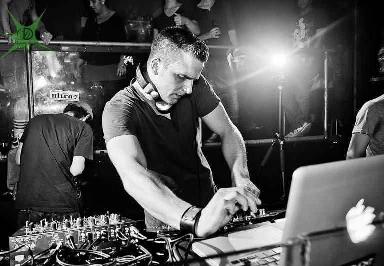 seamusthefreenomad in a black shirt is playing a dj - zil