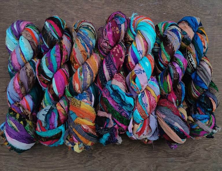 Recycled Patterned Chiffon 1" wide ribbon. 100g skein has a length of 70+ meters.