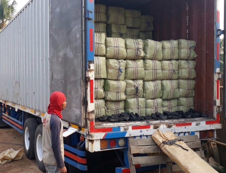 The process of loading dried gracilaria seaweed into containers for delivery to export buyers.