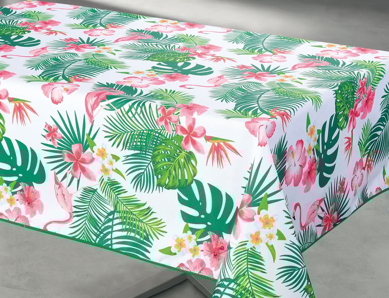 Une nappe avec une nappe au motif de jungle paradisiaque par dessus