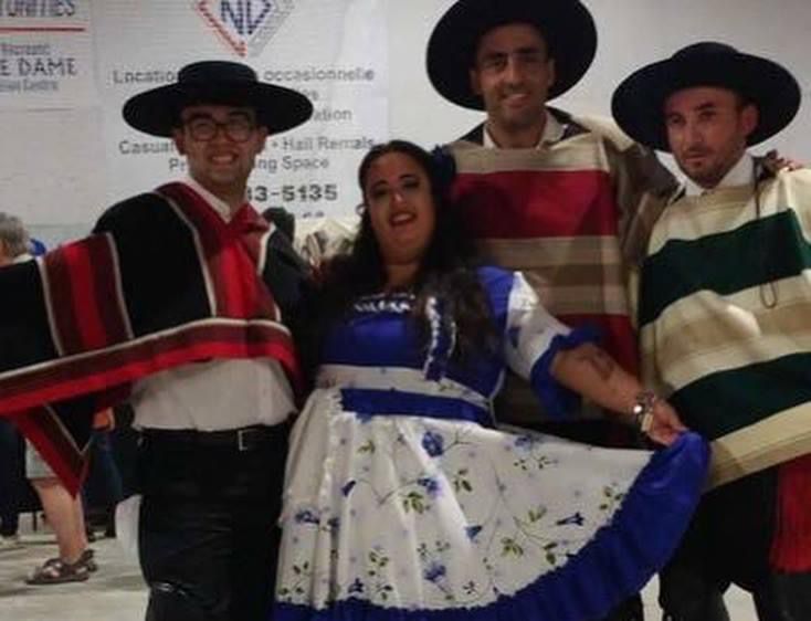 a group of people dressed in Chilean - style costumes