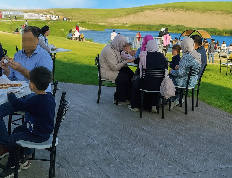 a family eating pizzas at a restaurant