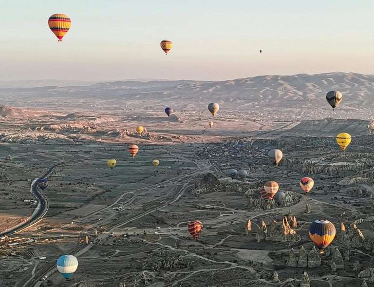  balloons are flying in the air at Fairy chimneys Cappadocia