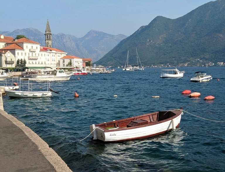 a boat in the water near a pier