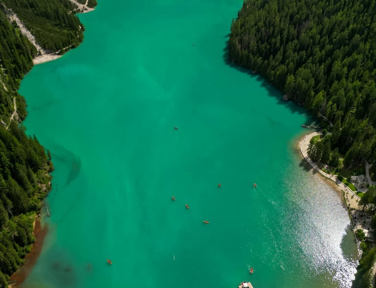 a lake with a boat on it and a boat in the water