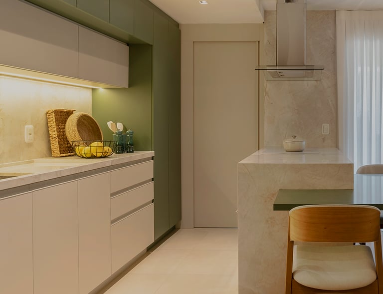 a kitchen with a table and chairs in the middle of the room
