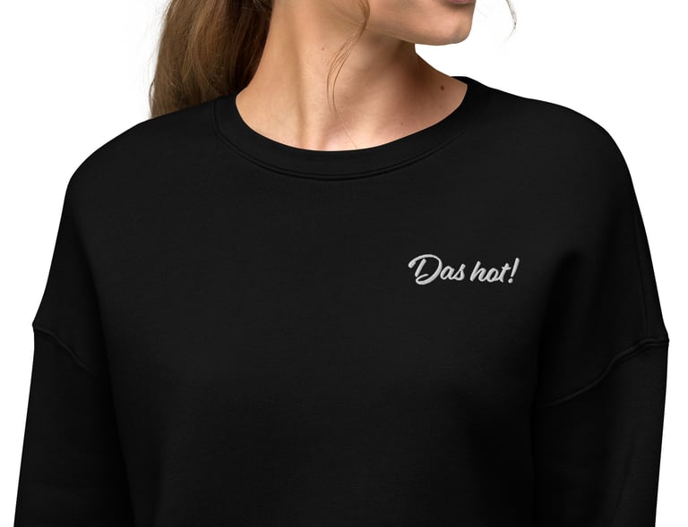 Woman in black Das hot embroidered white letters from view 