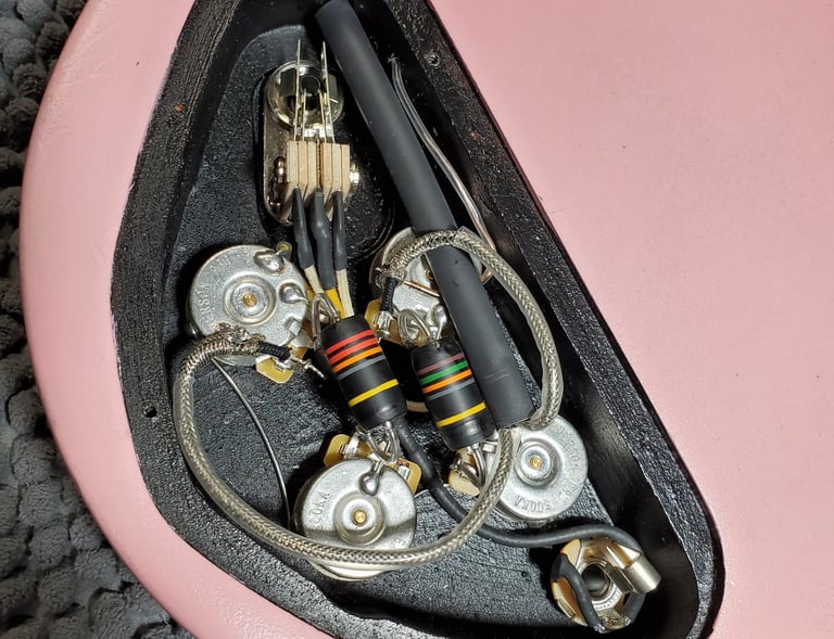 Professional vintage and custom guitar electronics installation and repair