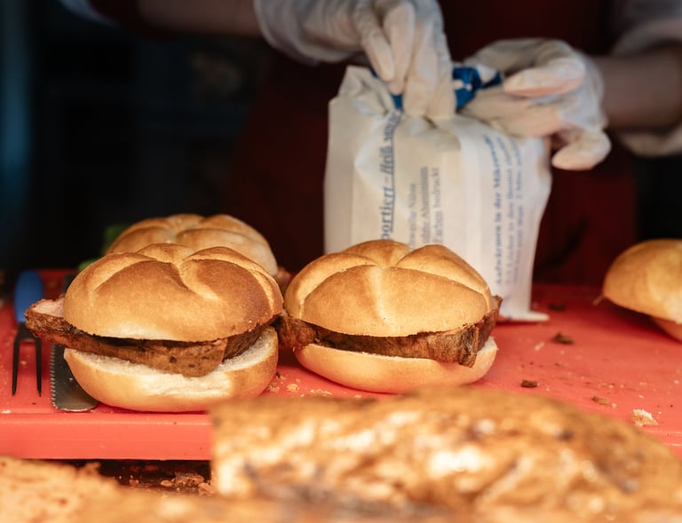 a bunch of sandwiches on a red tray