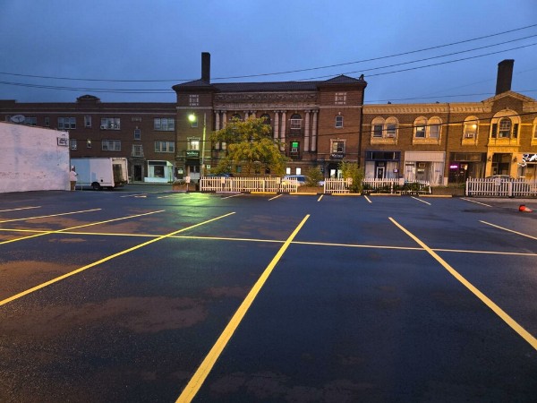 shows a freshly sealcoated and striped restaurant parking lot in Rocky River