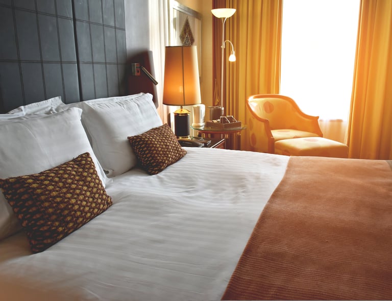 High End Hotel Room with sun shining through window