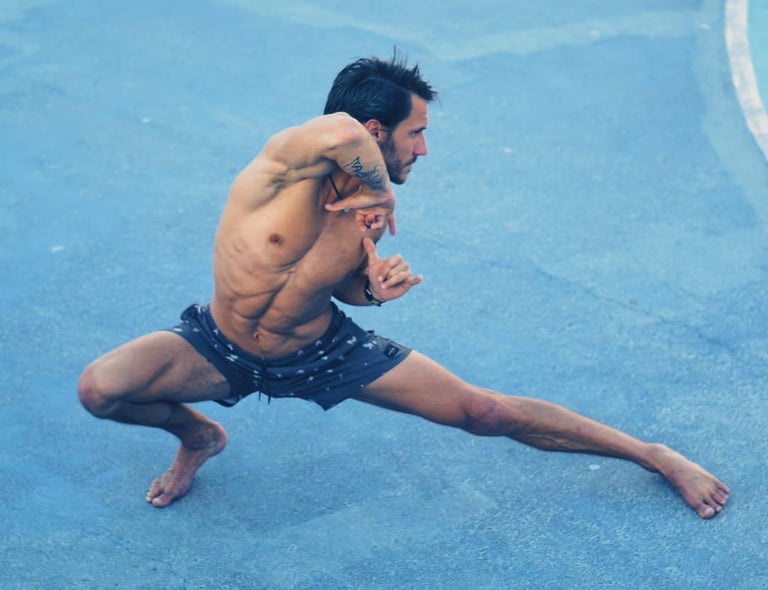 a man is doing a yoga pose from movement snacks online course