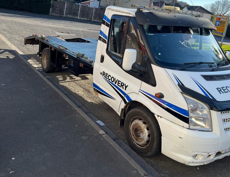 alt="Non-runner van loaded onto recovery truck in Great Malvern"