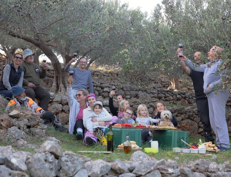 Family Picnic in Olive Grove with Wine Toast