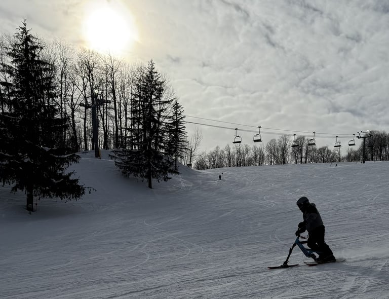 Ben Jones riding a snow bike
