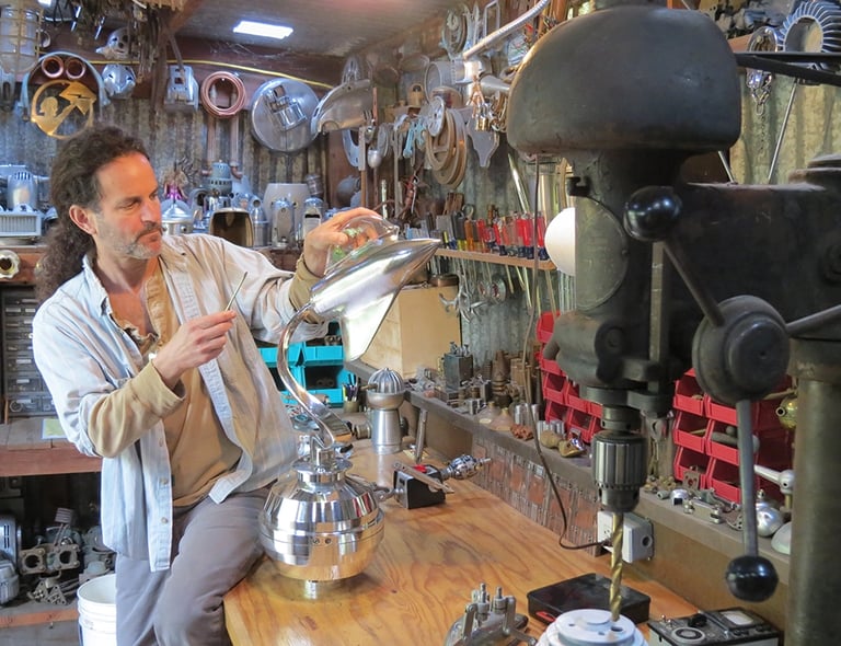 Tal Avitzur working on spaceship sculpture.