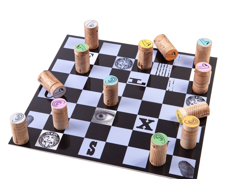Checkers board with colourful, scented checkers. 