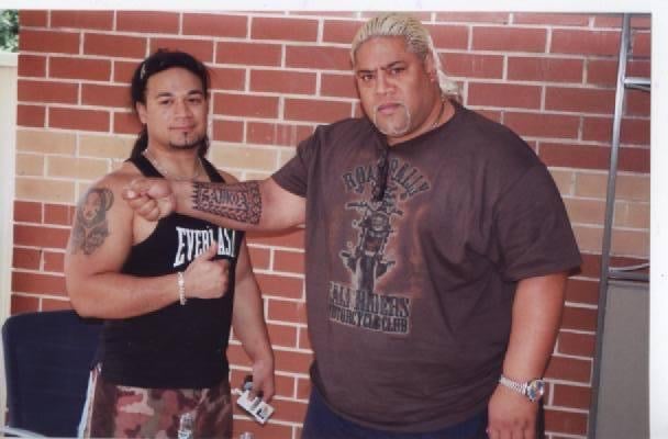 Tongan Tattoo artist Carl Cocker with WWE Hall of Fame wrestler Rikishi 