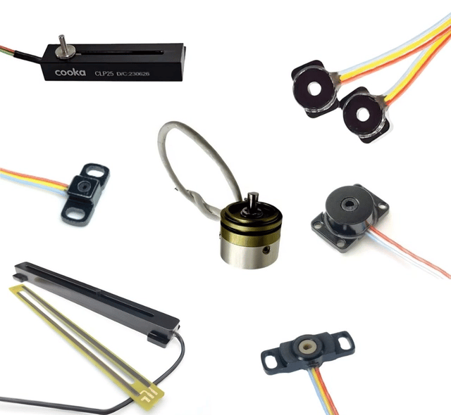a collection of electronic components including a speaker and wires