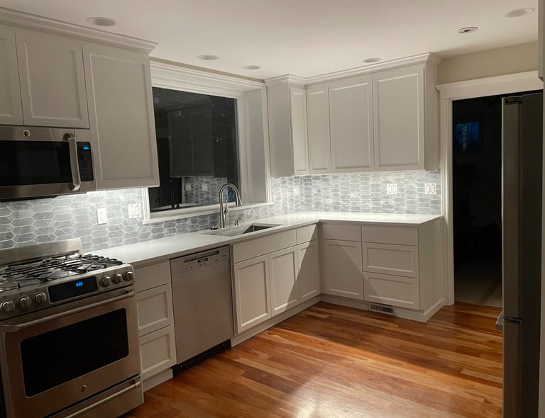 Seattle kitchen remodel, custom cabinets and quartz & marble tile backsplash. Home Improvement Srvcs