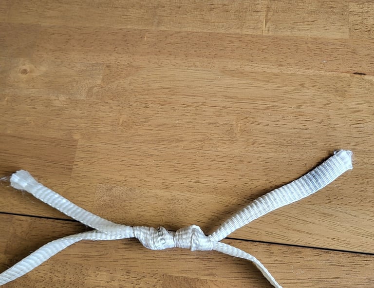 Double Fisherman's Knot joining two pieces of 2500 lb. Mule Tape