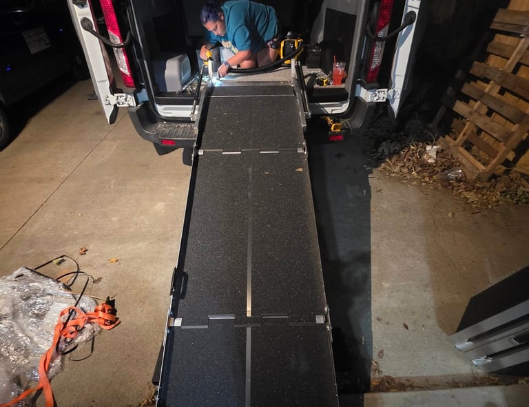 Completing a install of our van's loading ramp