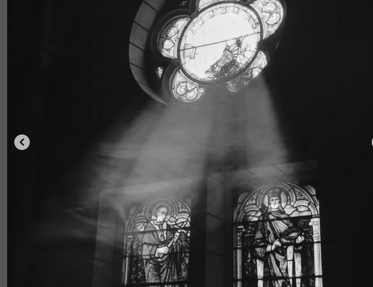 light emitting through stained glass windows to the soul