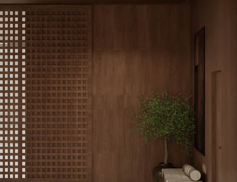 Warm interior with a wooden lattice screen and a daybed with a plant.