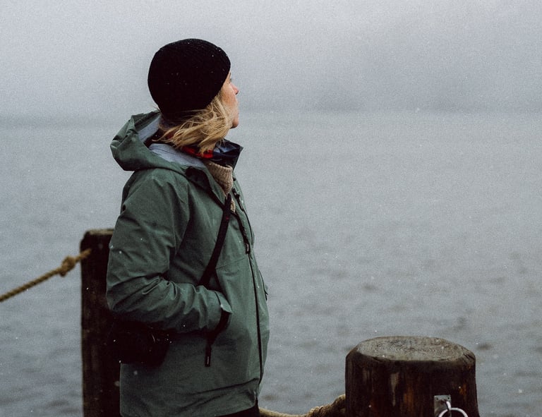 photo of a women wearing a finistere coat in scotland