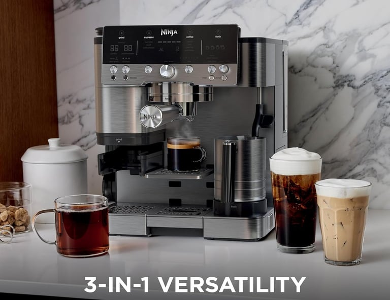 Ninja 3-in-1 espresso, cold brew, and filter coffee machine on a marble countertop with various cafe drinks.
