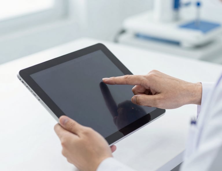 Hands of a medical professional pointing to a clear diagnostic image on a modern tablet screen, clean clinical setting, bright lighting, blue and white tones.
