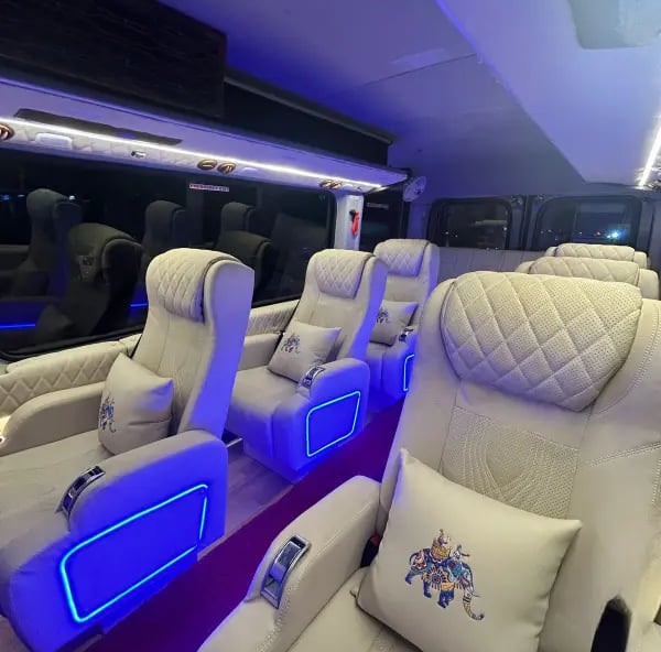 Urbania luxury tempo traveller interior for rent in Delhi with premium seating and modern design
