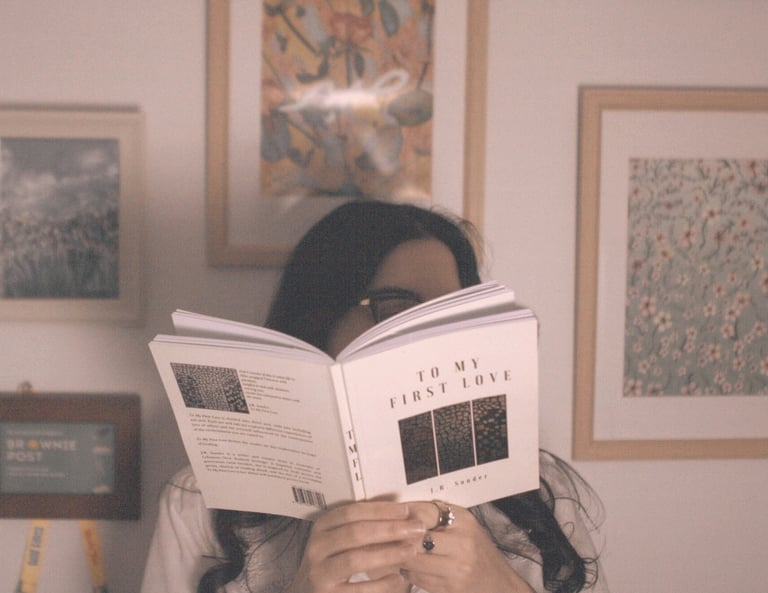 J.R. Sonder holding her book To My First Love (TMFL)