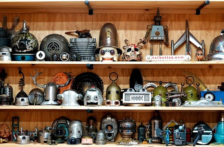 Shelves of parts in artist Tal Avitzur's workshop.