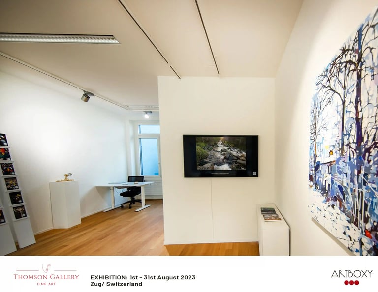 Photograph of a river appearing on a digital screen in an art gallery.