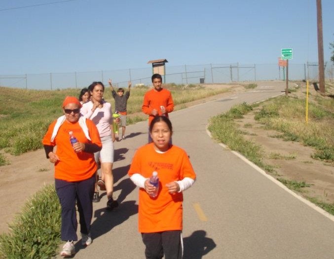 Enhancing Forward Action Inc. image of a group running