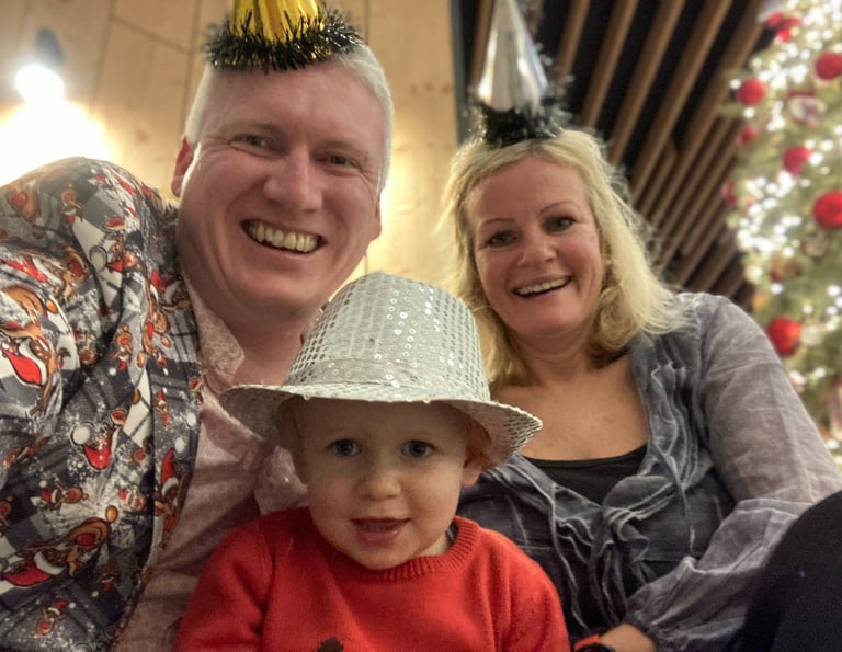 Family celebrating New Years Eve in Lake Bled