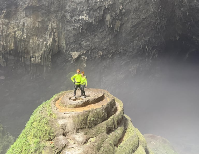 Nick and Tracey Billington on top of the wedding cake, hang son doong cave, Vietnam