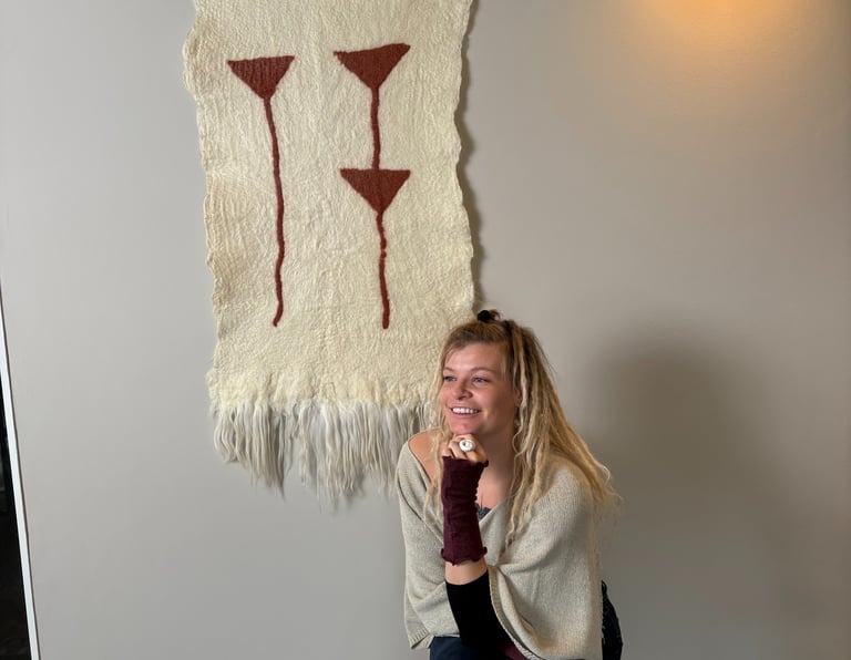 wool wall hanging felted tapestry women sitting on chair tribal pattern