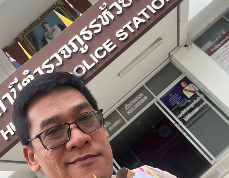 Lawyer at Police Station Sign “Lawyer assisting client at Pattaya Police Station – Chan Legal Adviso