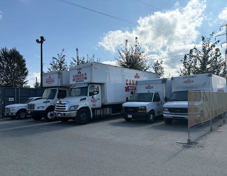 Canada’s Most Wanted Movers fleet lined up in a secure Port Coquitlam lot before dispatch.