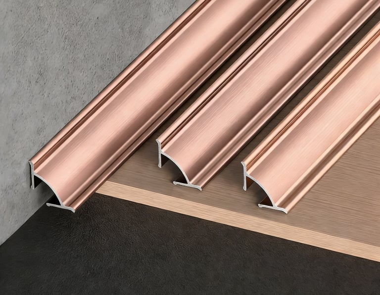Copper-colored metal floor transition strips: decorative trim for connecting concrete, wood, and tile flooring surfaces