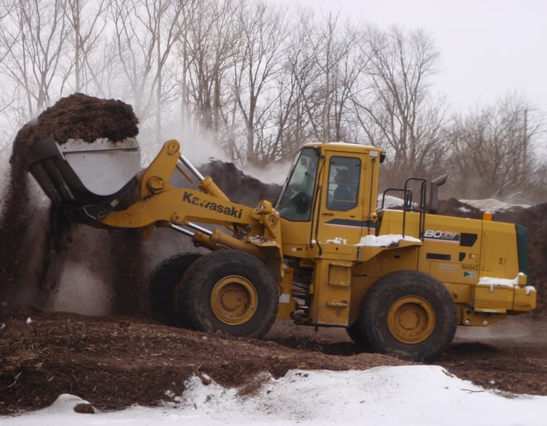 Wheel Loader Scooping Mulch