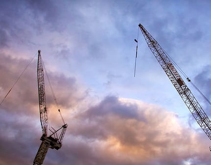 Steel Cranes with a sunset background
