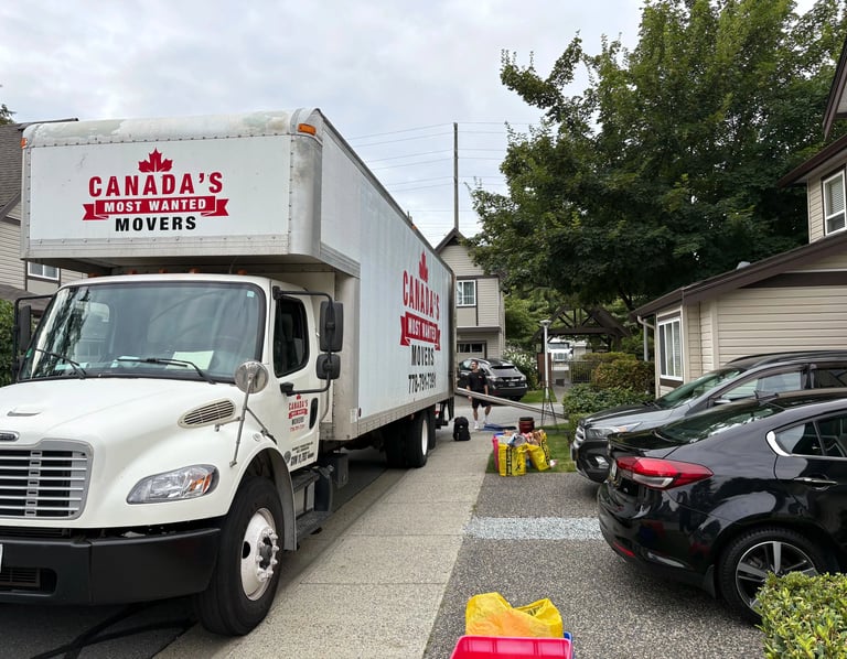 Canada’s Most Wanted Movers truck loading for a townhouse move in the Maple Ridge