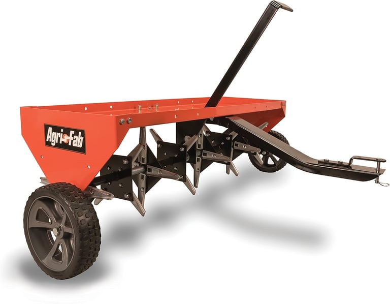 Agri-Fab tow-behind plug aerator with sharp steel tines for lawn soil aeration.