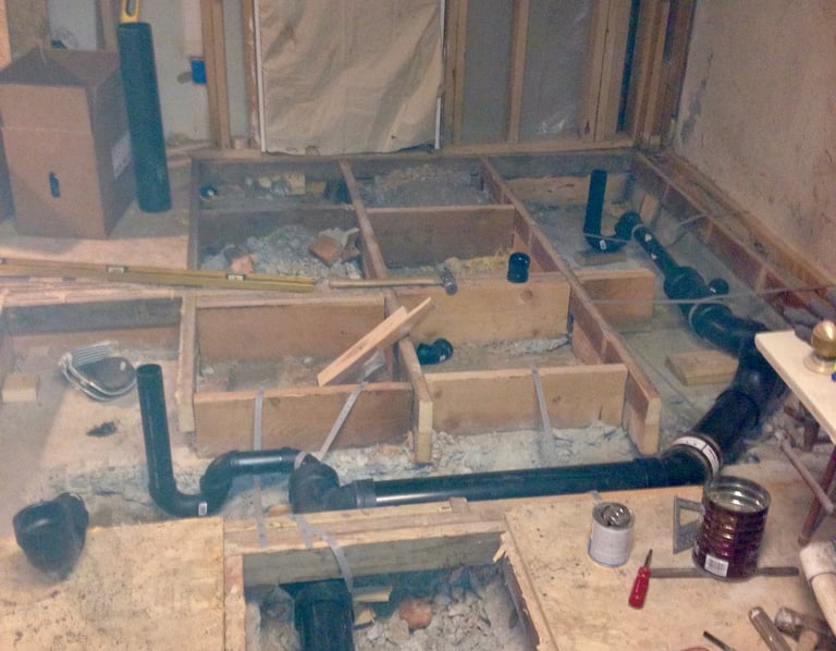“Unfinished basement in Fraser”  Yes!, concrete floors can be jackhammered out to add plumbing!