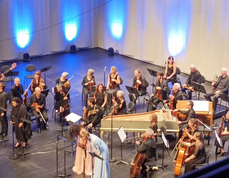 The singers take their bow.