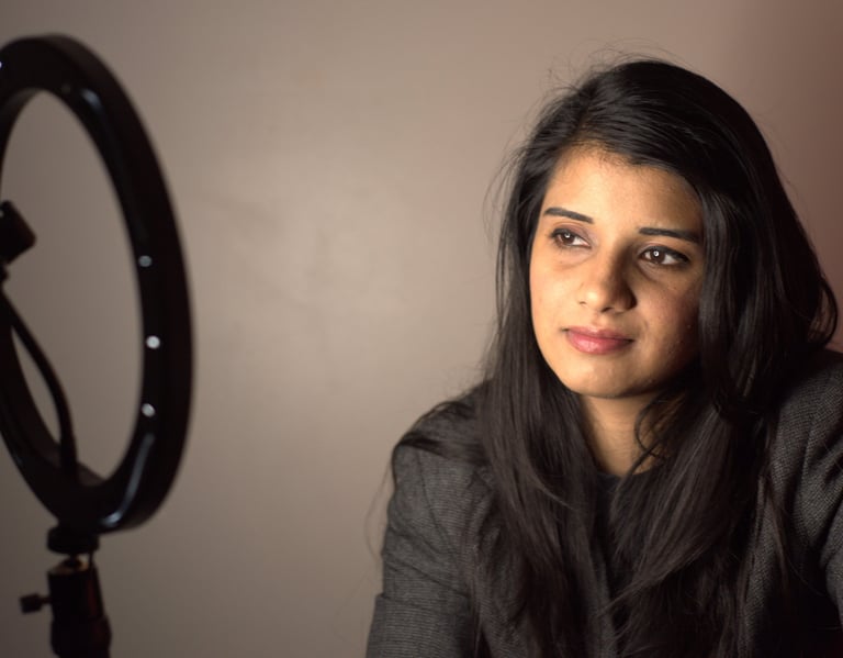 Rio looking at ring light in a sombre mood